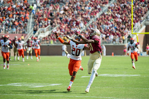 FSU's George Campbell extends his arm for a catch in the Seminoles' 45-21 win over Syracuse on Saturday. The Orange lost its fifth straight. 